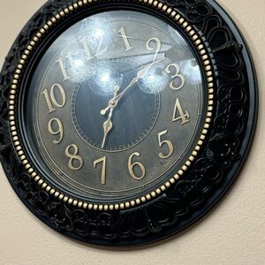 Elegant Black and Gold Wall Clock